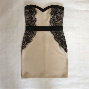 Strapless form fitting dress with black lace